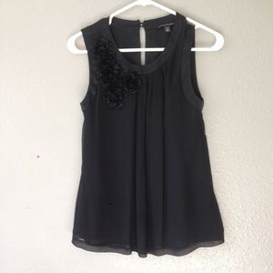 Banana Republic black sheer top over shell.